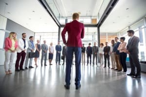 Business leaders addressing staff