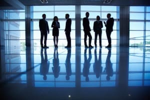 Business people in the dark