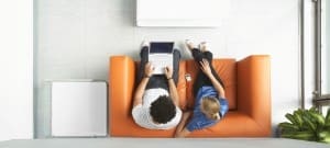 People sitting on a sofa having a meeting